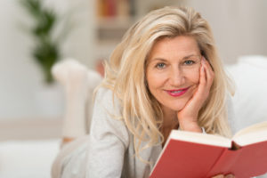 Woman reading a book with monovision