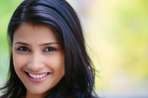 Young woman smiling after LASIK