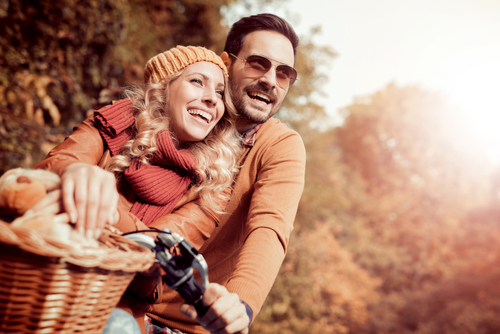 Young couple smiling after LASIK