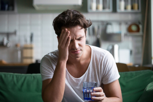 Man suffering from dry eyes