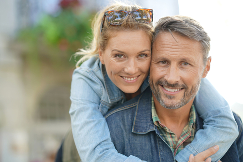 Couple smiling after LASIK