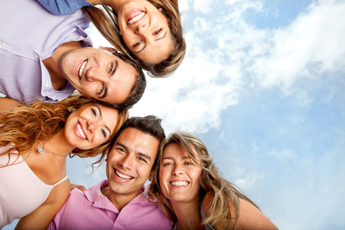 Young people smiling after LASIK