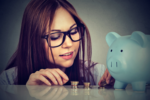 Woman counting her money for LASIK